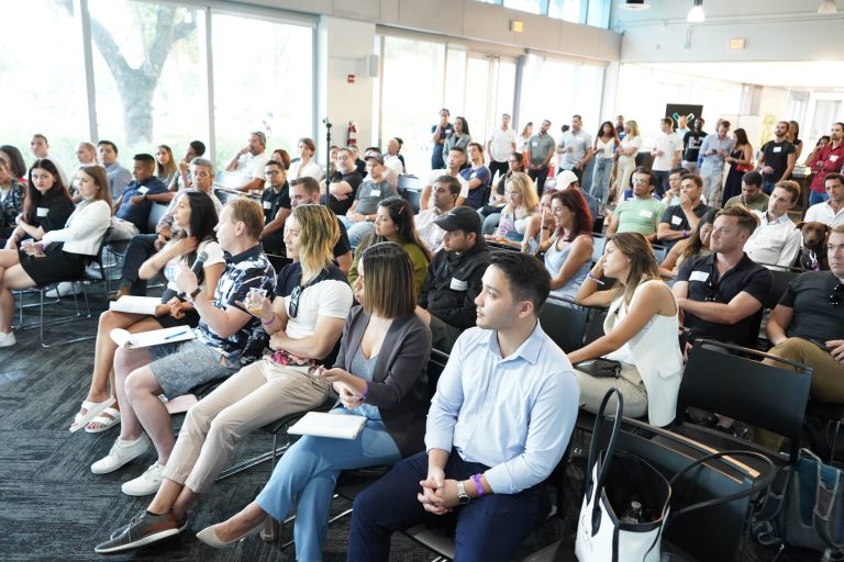 Group of people listening to a presentation